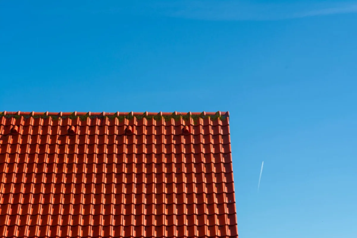 Tile roof gable in full sun, the kind of exposure that sets roof life in Puyallup, WA